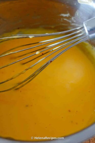 Ready Hollandaise Sauce in a saucepan.