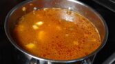 Step 5. Add water, paste and garlic