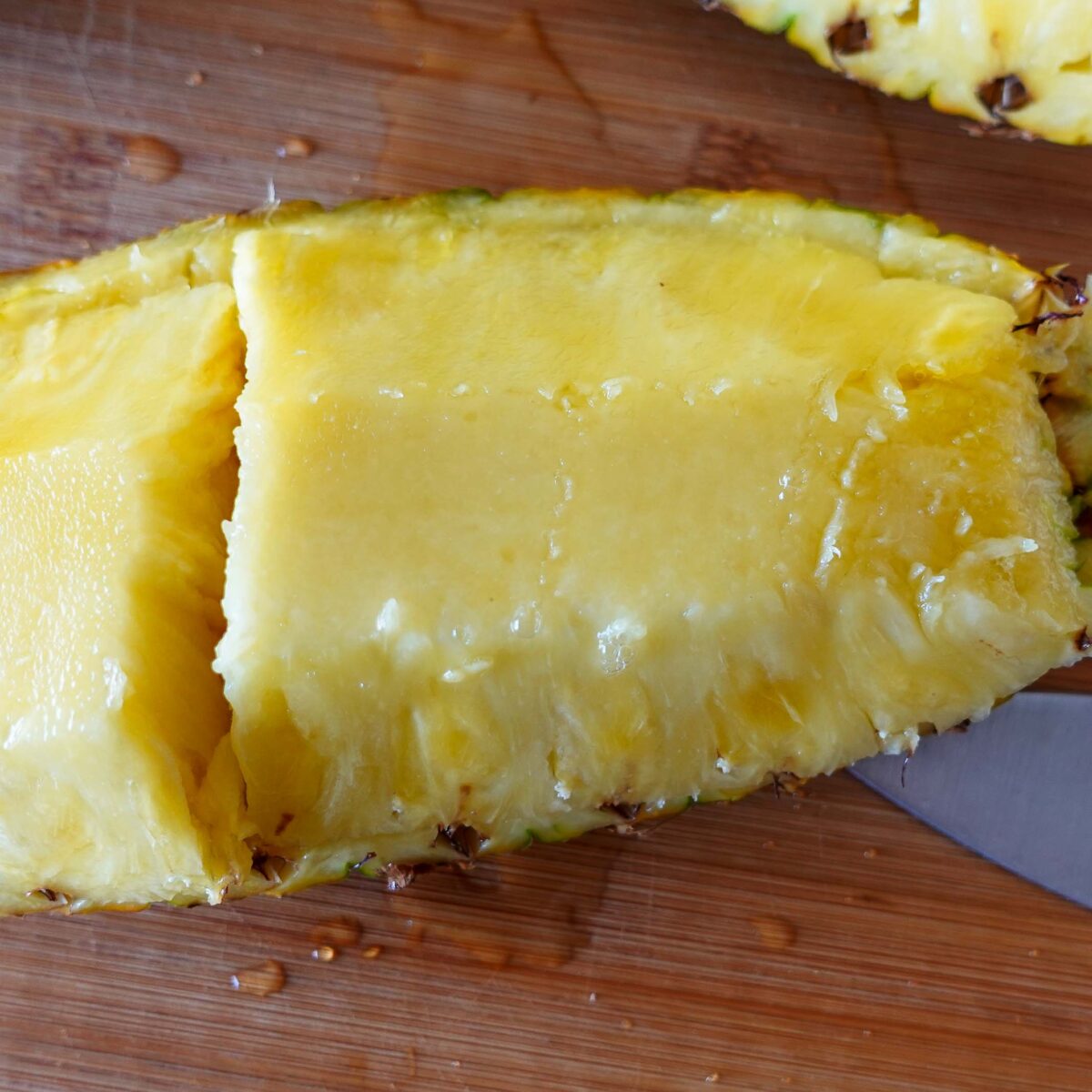 Step 2. Peel pineapple