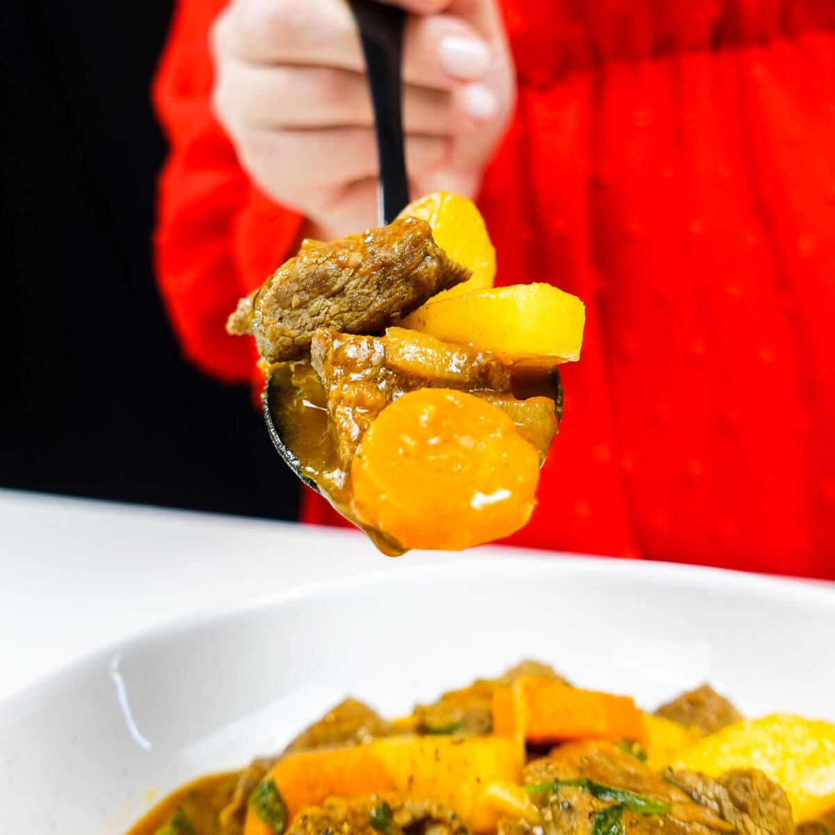 A spoonful of the delicious Mediterranean Beef Carrot Potato Stew