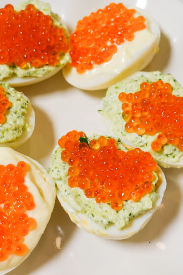 Salmon Caviar Deviled eggs on a table