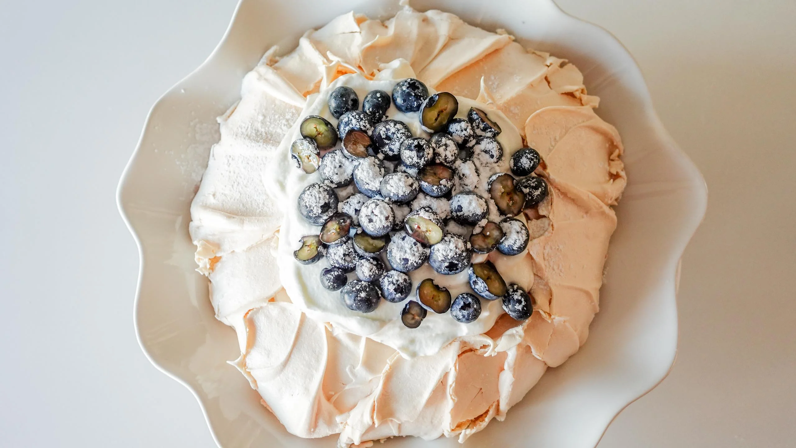 Blueberry Pavlova on a plate.