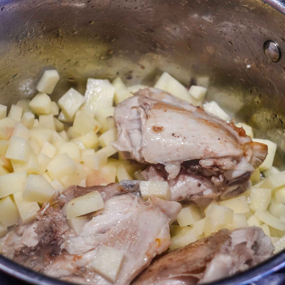Step 3. Add potato and water