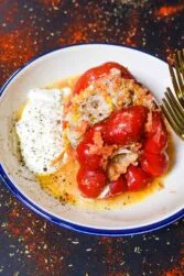Stuffed Peppers with Ground Beef and Rice Recipe in a bowl with yogurt.