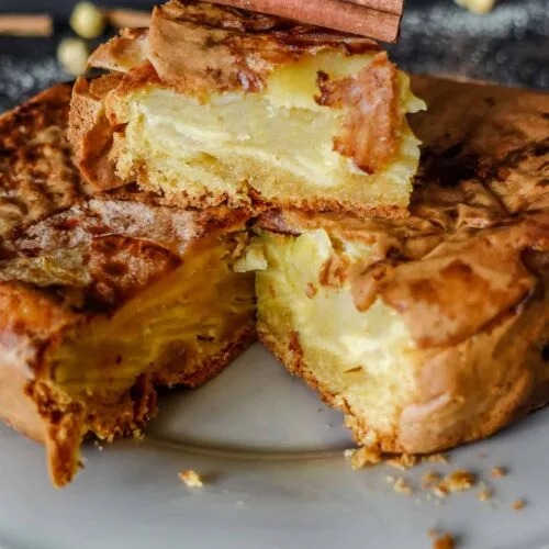 Apple Cinnamon Cake sliced on a plate.
