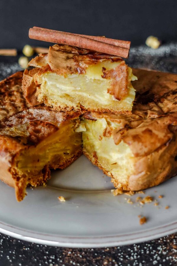 Apple Cinnamon Cake sliced on a plate.