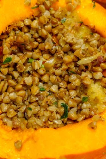 Ready Stuffed Pumpkin in a pan with a foil.