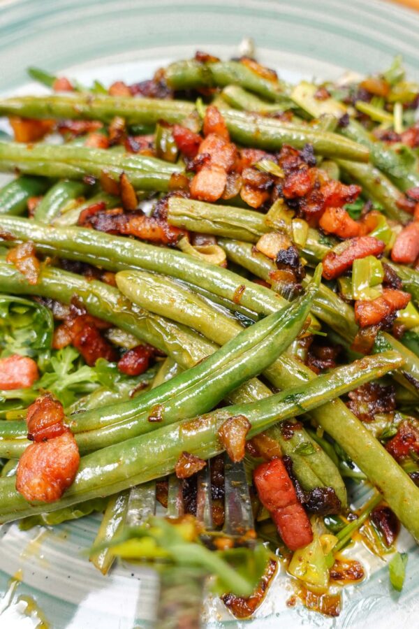 French Green Beans with Bacon on a green plate