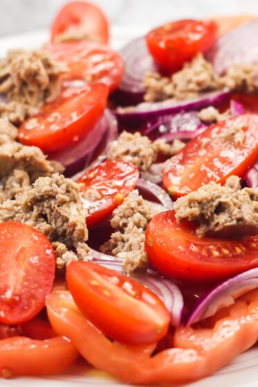 Tuna Tomato salad on a plate.