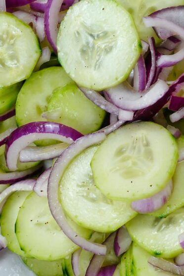 Cucumber Red Onion Salad Recipe in a big white bowl.