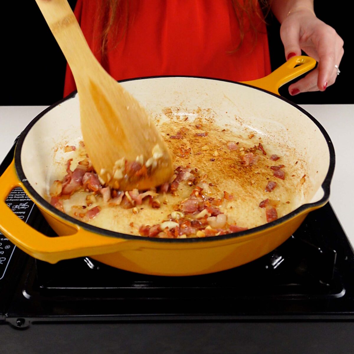 Step 2. Fry bacon and garlic
