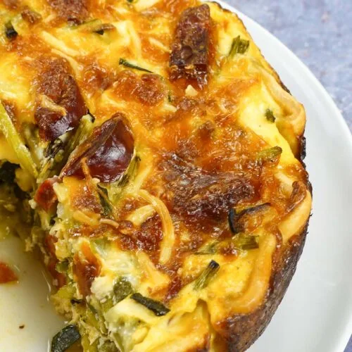 Chorizo Asparagus Quiche on a plate.