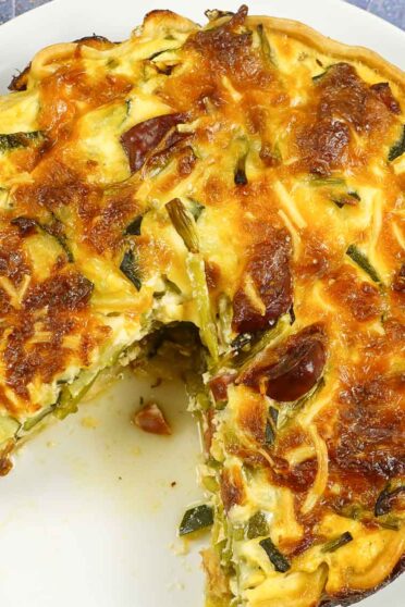 Chorizo Asparagus Quiche missing a piece