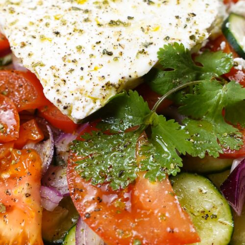 Mediterranean Tomato Cucumber Feta Salad served.