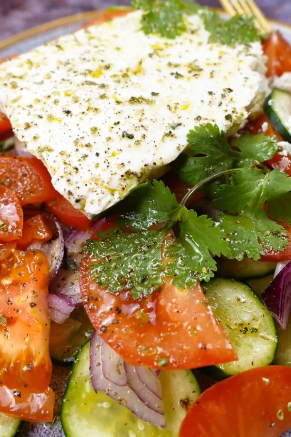 Mediterranean Tomato Cucumber Feta Salad served.
