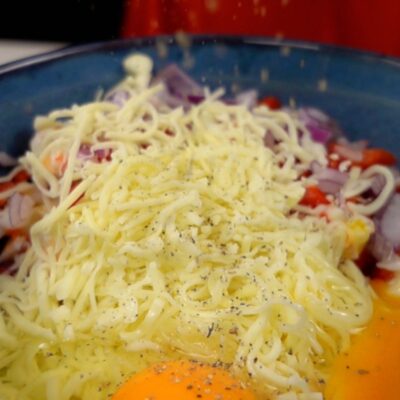 Step 2. Add eggs and cheese