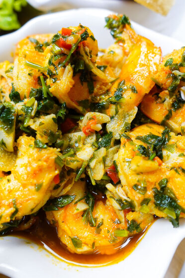 Portuguese Garlic Shrimp on a plate with sauce