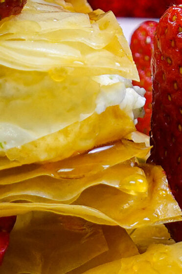 Strawberry Napoleons with fresh strawberries around