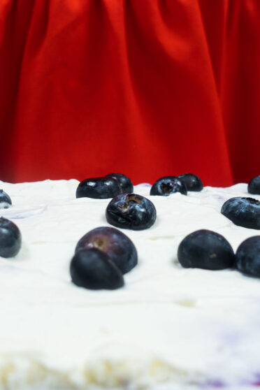 A picture of Helena with blueberry tray