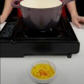 Step 2. Add saffron and reduce