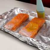 Step 2. Brush and top salmon