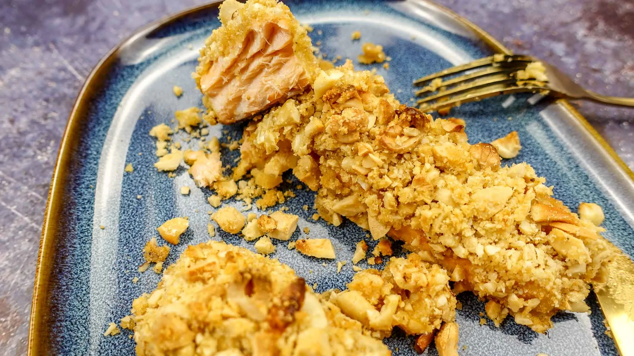 Two pieces of cashew crusted salmon