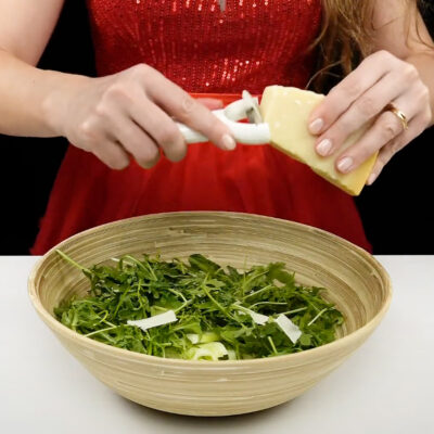 Step 2. Add arugula and cheese