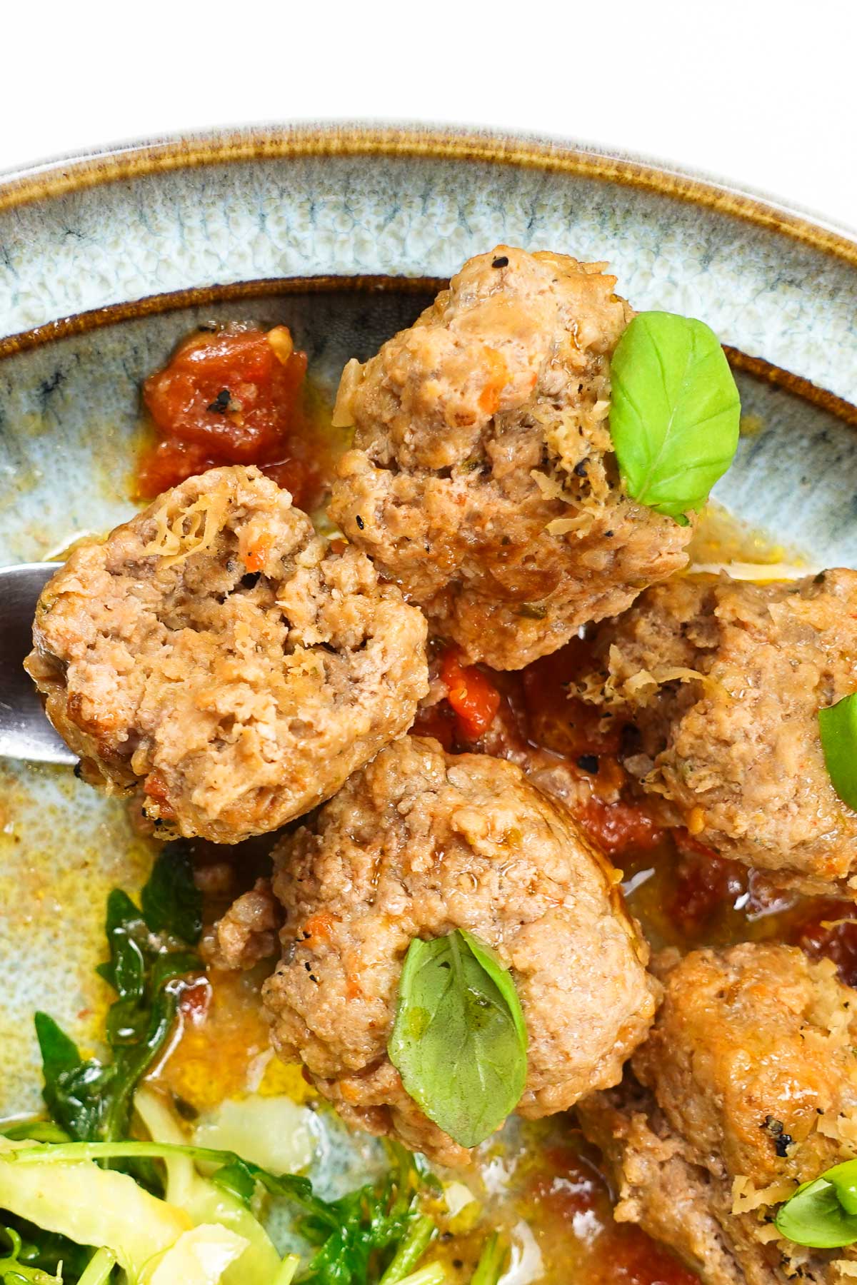 A plate with delicious meatballs with black truffle mushroom