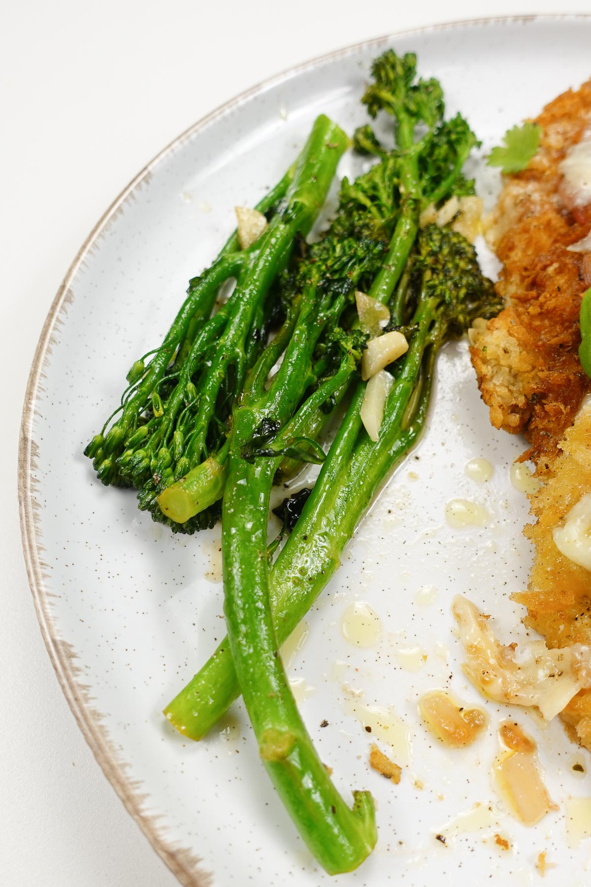 Delicious and perfectly cooked broccolini on a plate