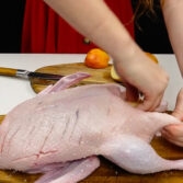 Step 2. Pierce the skin, Season the duck, Stuff with apples