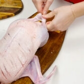 Step 2. Pierce the skin, Season the duck, Stuff with apples