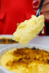 Helena is holding a spoonful with portuguese Custard cream