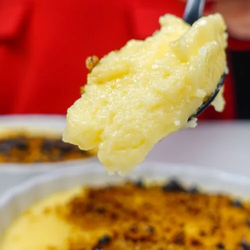 Helena is holding a spoonful with portuguese Custard cream