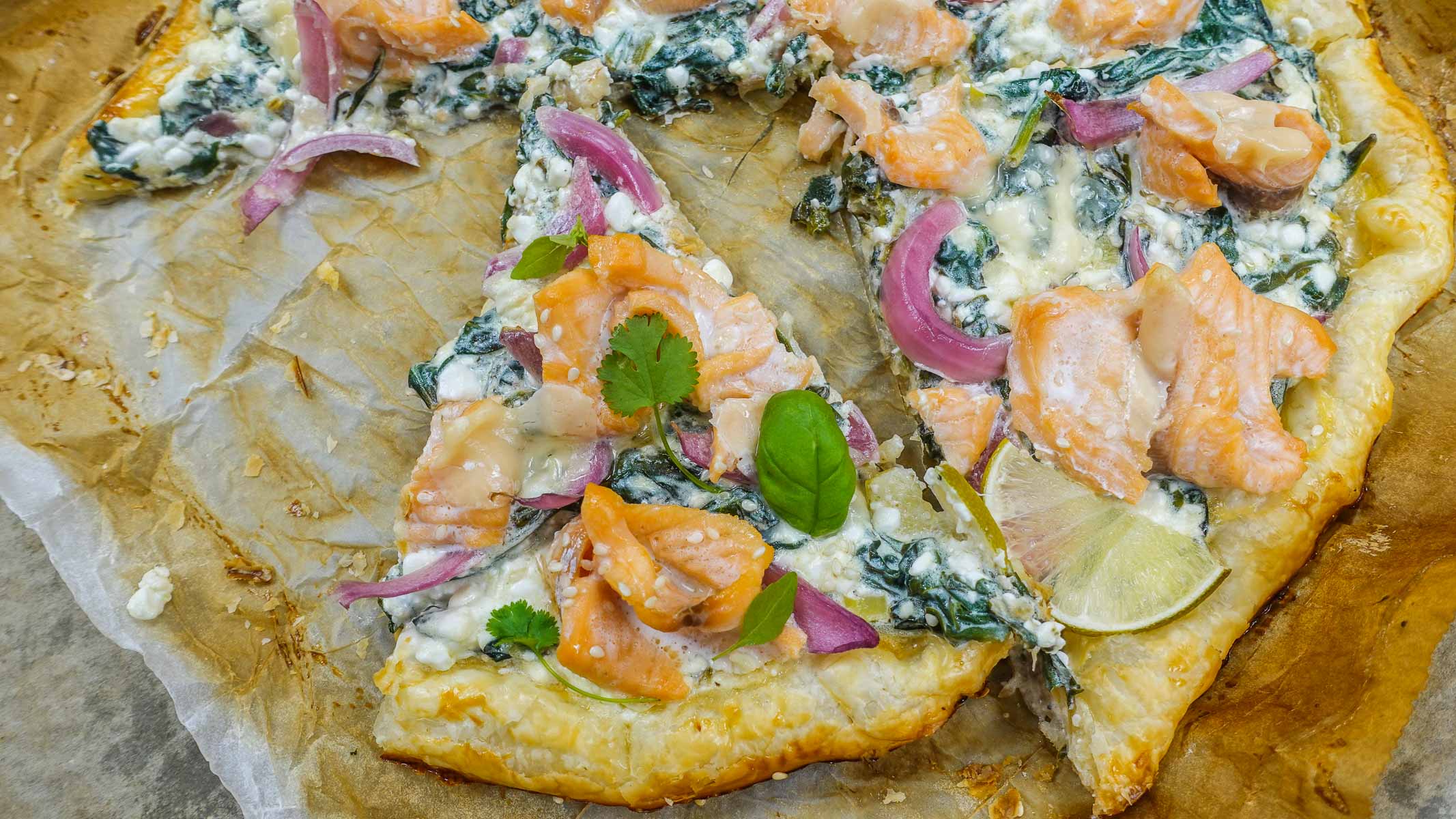 A delicious piece of smoked salmon tart with cottage cheese on the tray