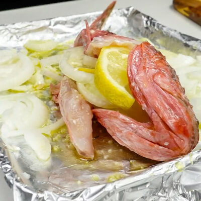 Step 3. Add lemon and bake the scorpionfish