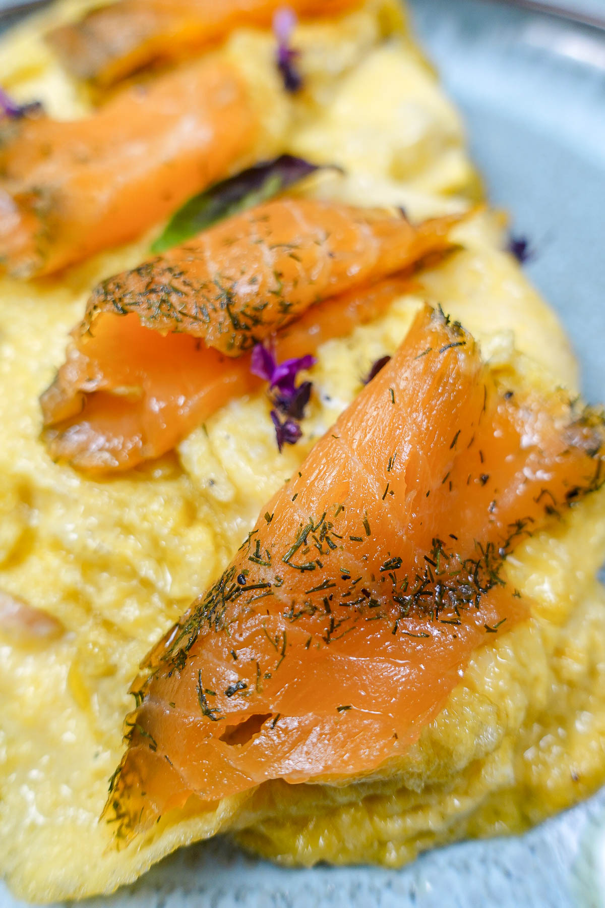 A closeup of Salmon Omelette on a plate.