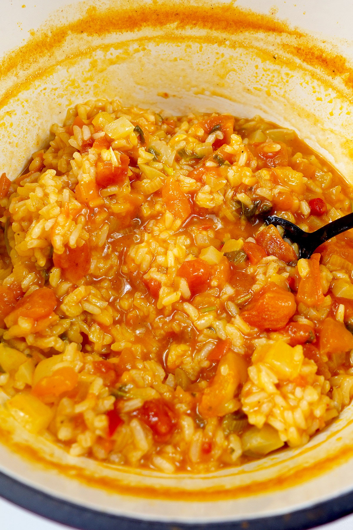 Portuguese tomato rice in the cooking pot.